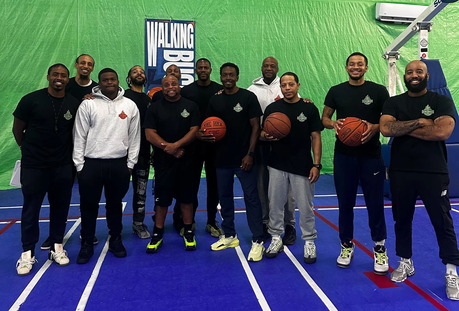 The Hoop Lab coaching team together in the gym